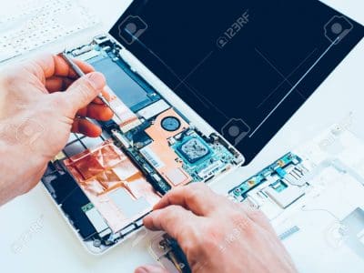 121260644-laptop-repair-service-pc-hardware-upgrade-and-maintenance-engineer-fixing-broken-notebook-computer-t.jpg